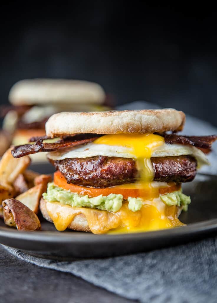 Breakfast Sandwich with Smoked Sausage, Bacon, and Egg. Quick and healthy breakfast recipes - easy and incredibly delicious meals for busy mornings! Find easy to cook omelette, cheesy burrito, breakfast sandwiches, some sweets like smoothies, parfaits, pancakes, and more!