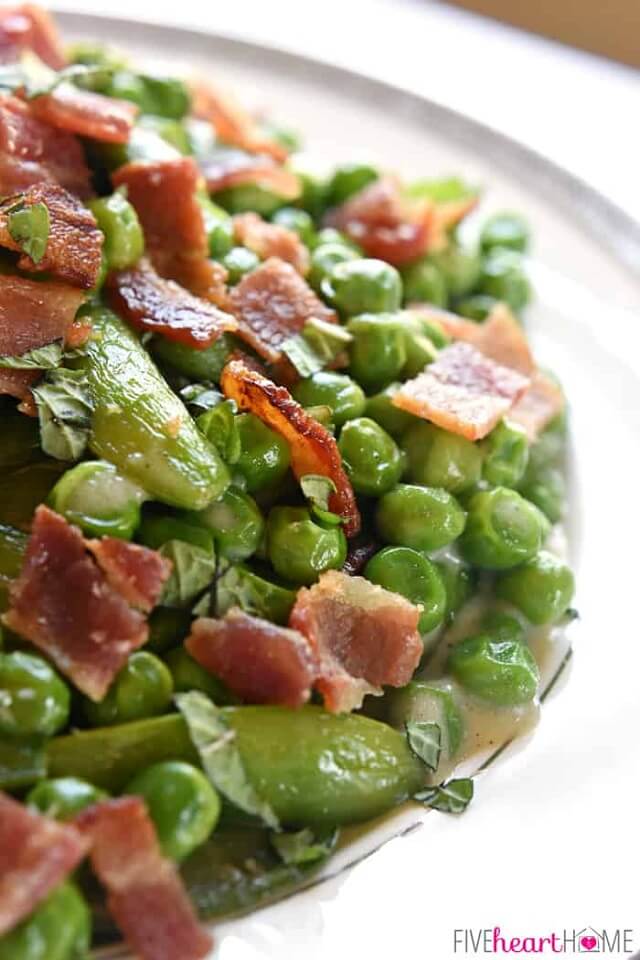 These Easter side dishes are the ideal complement to any main course! Fill your table with crowd-pleasers like peas and prosciutto, creamy mac and cheese, roasted asparagus, and more!