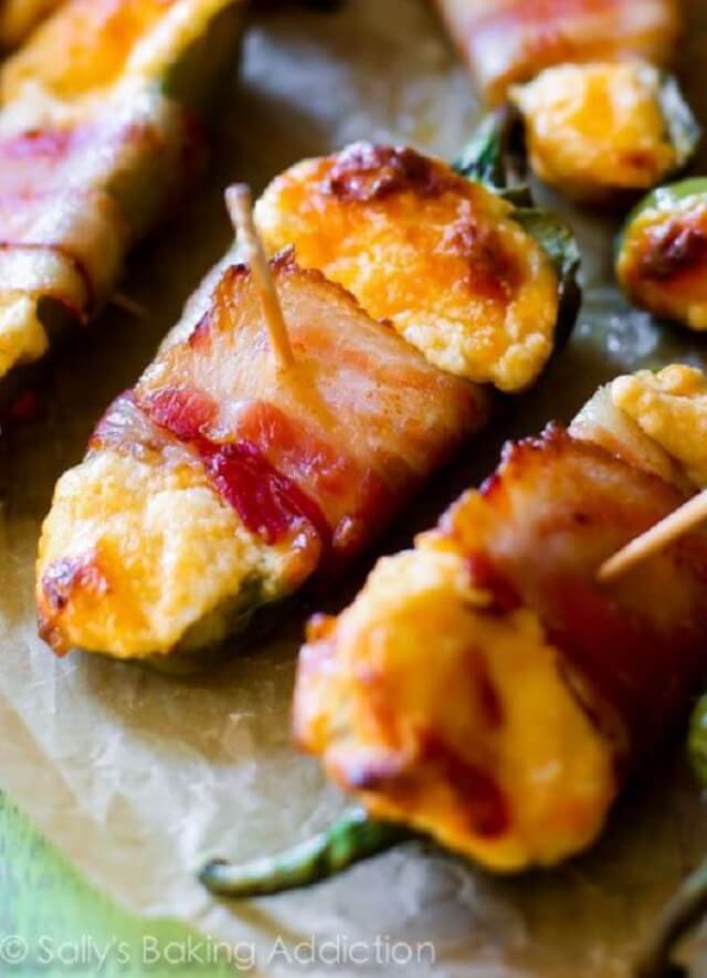 They're often the first to disappear when I bring spicy, cheesy, and creamy bacon-wrapped cheese stuffed jalapenos to a gathering.