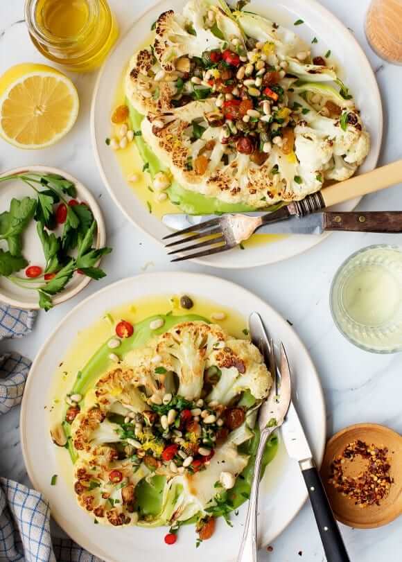Roasted Cauliflower Steak: Looking for mouthwatering Easter delights that are completely vegetarian? You're in for a treat! Check out our fantastic collection of Easter vegetarian recipes that'll satisfy all taste buds. Get ready to indulge in deliciousness! #EasterVeggieFeast #EasterVegetarian