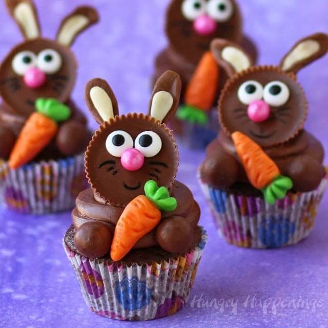 topped with a big swirl of chocolate frosting and an adorable chocolate peanut butter cup bunny