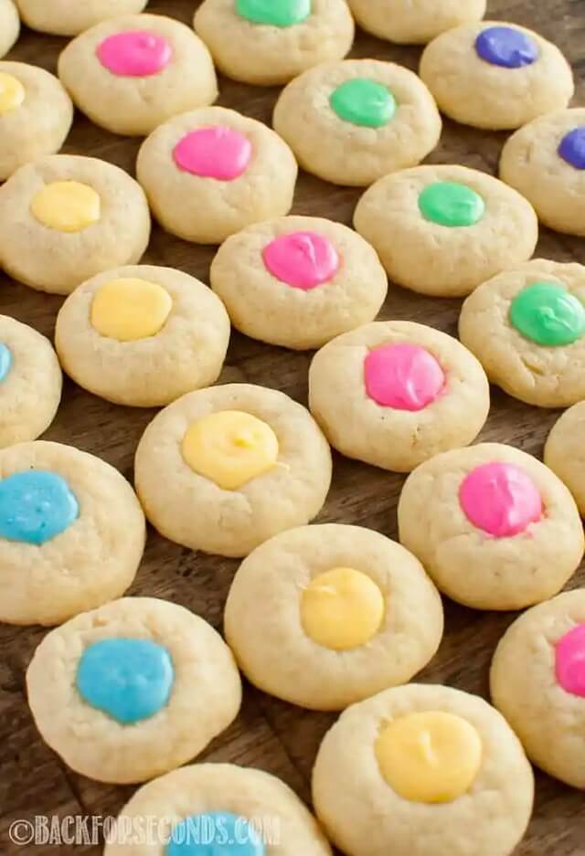 soft, perfect sugar cookies, with pretty pastel white chocolate filling