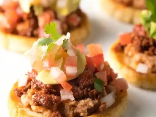 From dips to authentic guacamole and tamales, these Mexican appetizers are the perfect way to start your Taco night or Cinco de Mayo party!